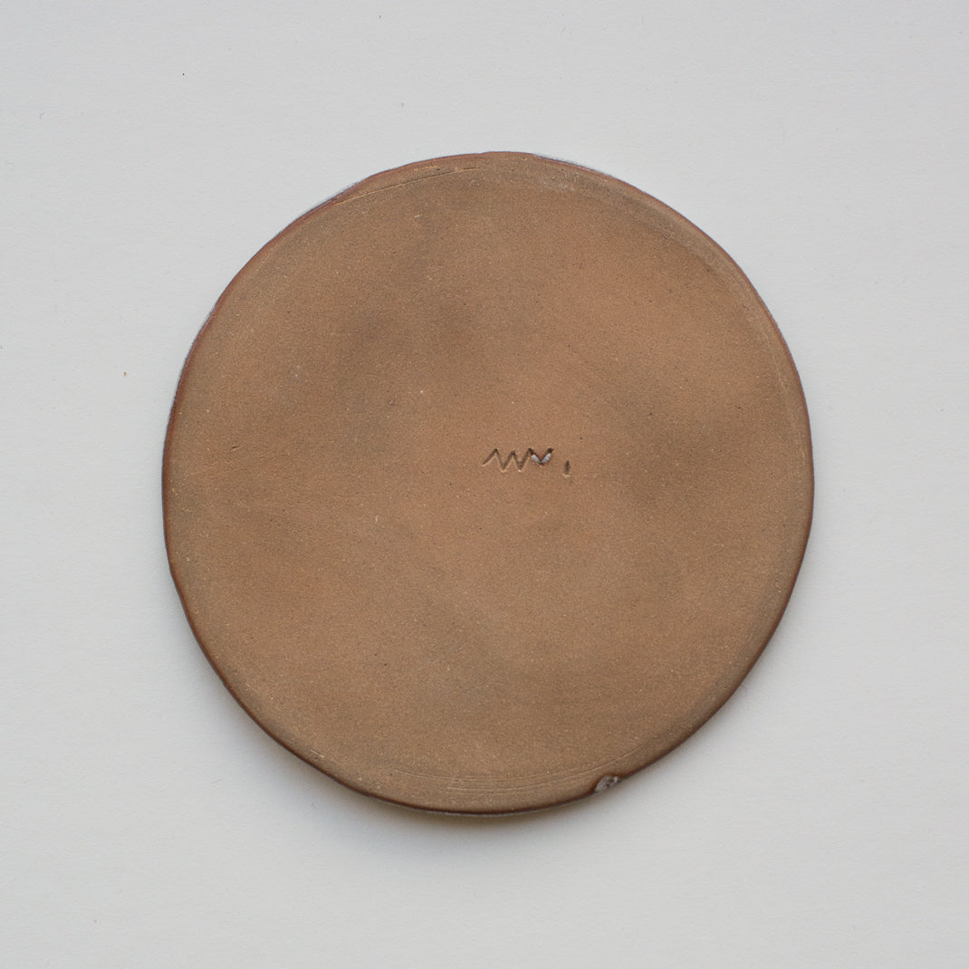 Assiette marron glacé en grès réalisée par Marion Graux, céramiste