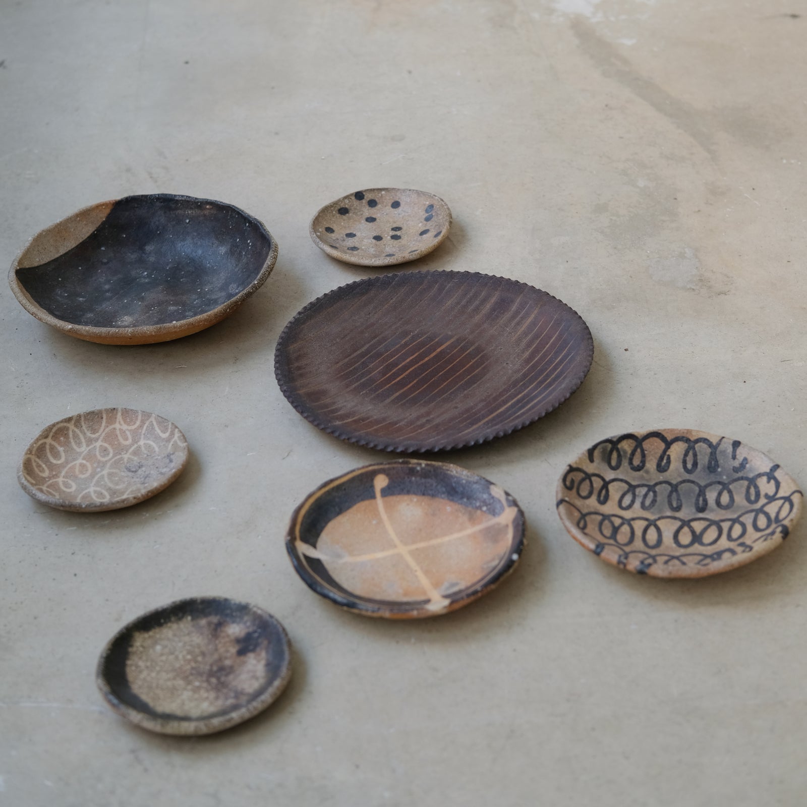 Yakishime stoneware plate D 12cm - 02 by Yoji Yamada at Brutal