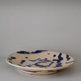 Plat 02 en faïence rouge D 48cm - Multicolore d'Héloise Bariol chez Brutal Ceramics