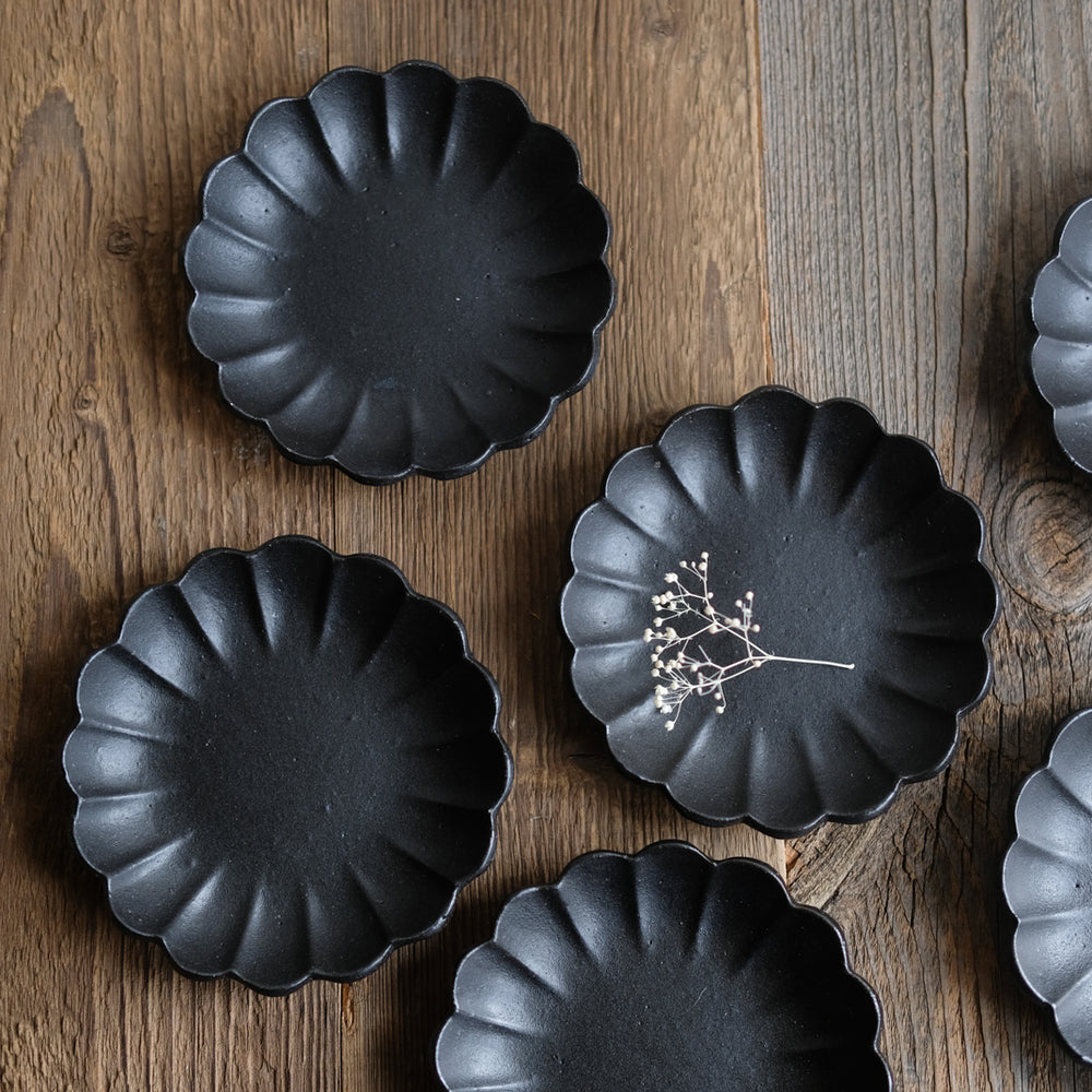 Black flower plate by Shin Ito at Brutal Ceramics