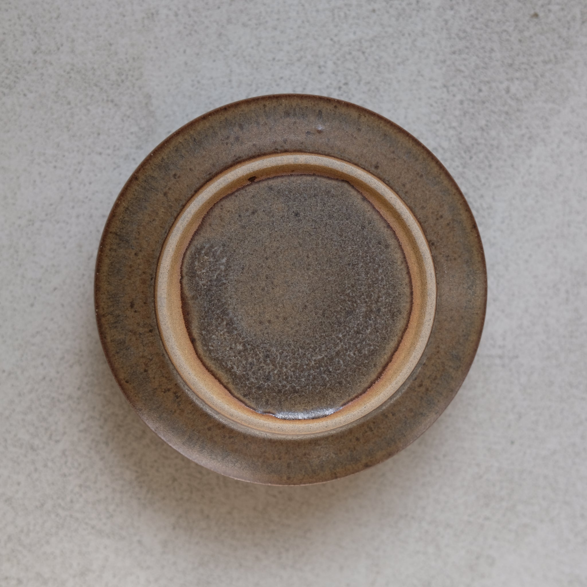 Bol en grès marron foncé par Malo chez Brutal Ceramics